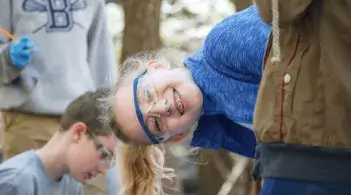 4H student smiles at the camera