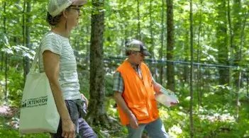 2 people in the woods