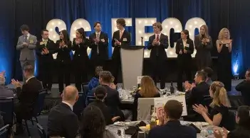 Members of the Student Leadership Team are recognized on stage during the SG-FECC 2026 final dinner 