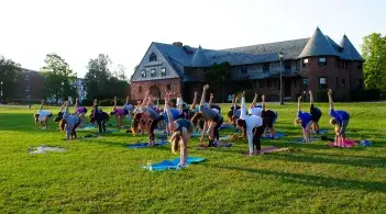 people doing yoga outside