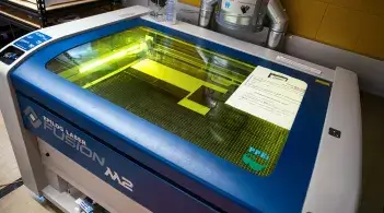 Top down view of an industrial  laser cutter