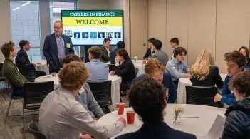 Jamie Flicker engages with students during networking event