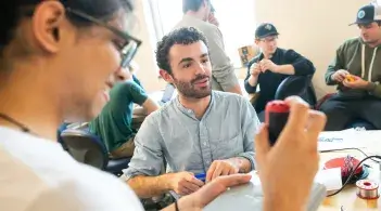 Graduate students conducting hands-on learning