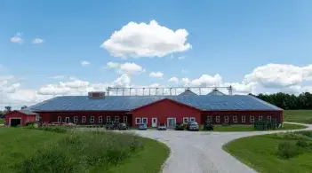 Red research station with bright blue sky background