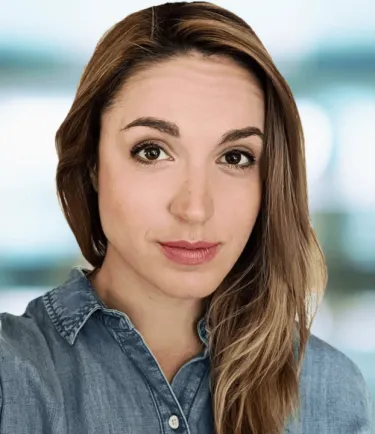 Headshot of the researcher with a blurred background.