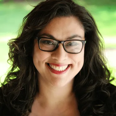 Smiling woman with glasses