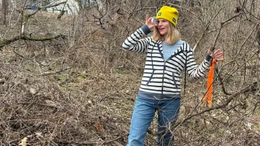 Woman measuring trail path