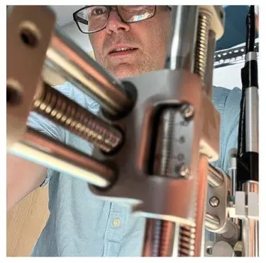 Photo of Jeremy Barry working in lab