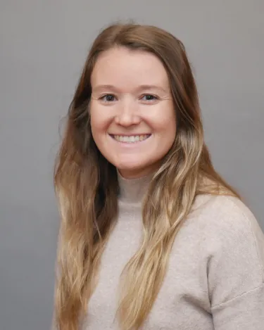 A person wearing a sweater