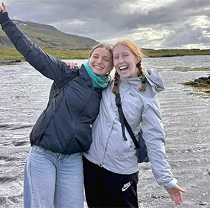two young women smiling