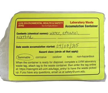 Yellow waste accumulation sticker
