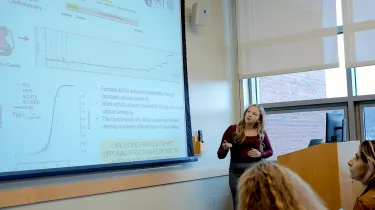 Woman presenting research