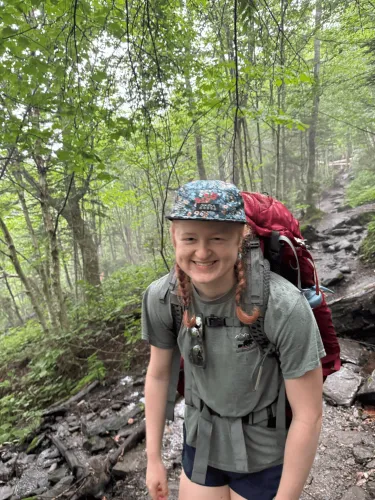  A woman hiking in the woods