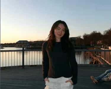 Woman standing near a lake