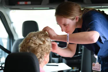 Dermatologist conducting a skin check