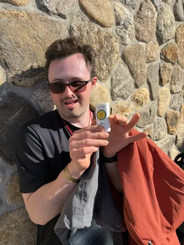 Special Olympics athlete showing off sunscreen