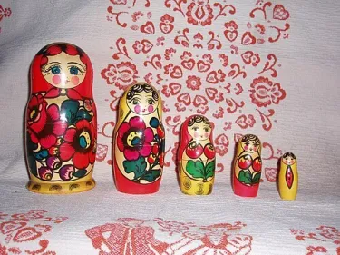 A set of five brightly painted wooden matroshka dolls