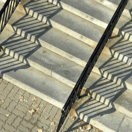 abstract shadows cast on granite steps