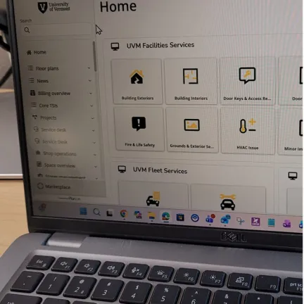 laptop computer screen showing planon menu icons