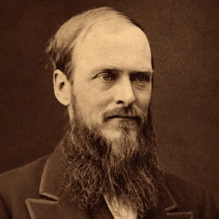 photo portrait of Pringle at age 38 - bright eyes, beard and sideburns, gazing into the distance
