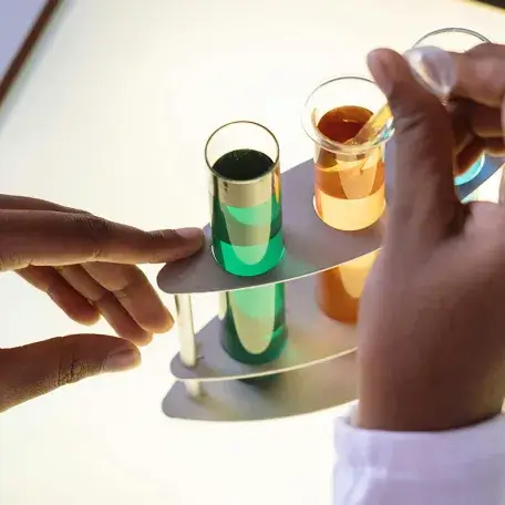 closeup of someone handling a test tube