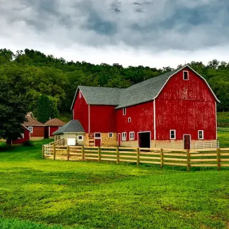 red barn and green lawn