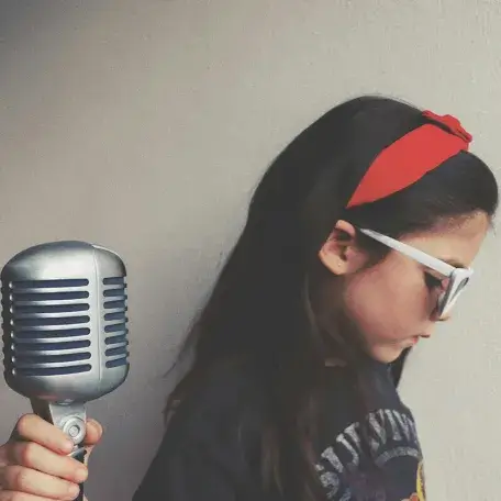 youngster with an old-fashioned microphone