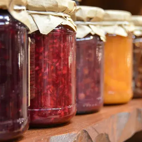 glass jars of fruit preserves