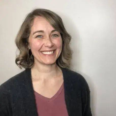 Headshot of Ramsey smiling