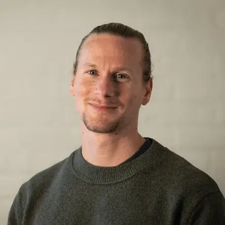 Tim Rademacher smiling at the camera