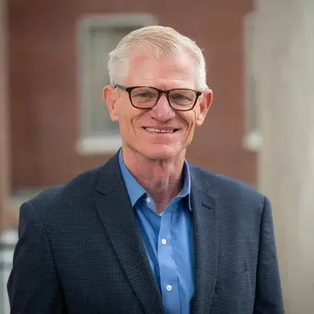 Andrew G Zehner