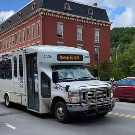 Small bus traveling in Montpelier