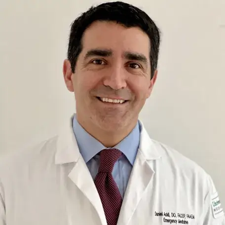 headshot of smiling doctor