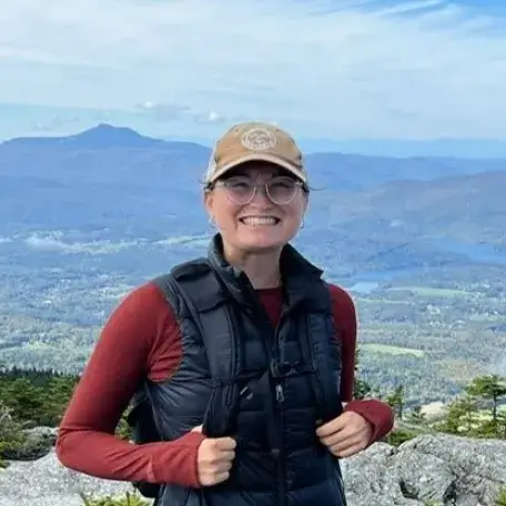 Emily on a mountain summit