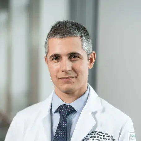 headshot of smiling doctor