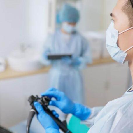 Doctor performs colonoscopy colorectal screening