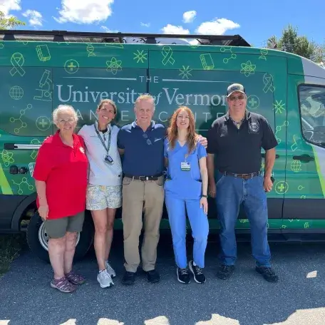 cancer center outreach team in front of outreach van