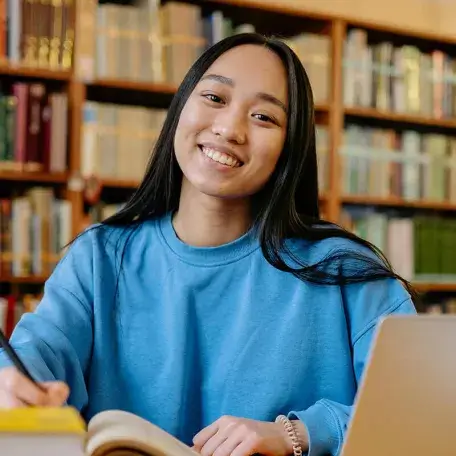 young woman in a library