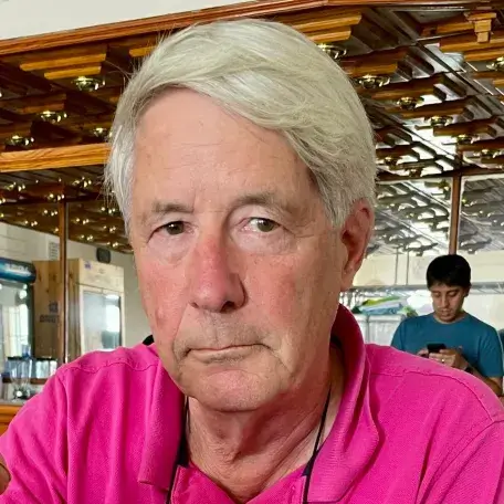 Jim in a hot-pink shirt