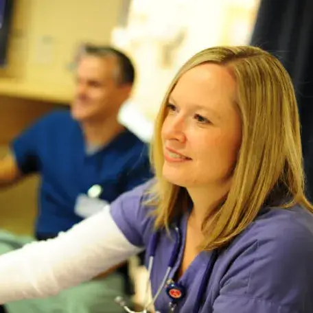 two nurses in a hospital setting
