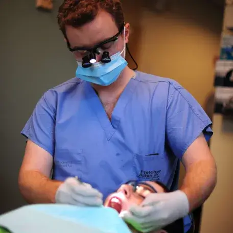 dentist working on patients teeth