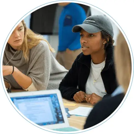 Students discuss a project in the College of Engineering and Mathematical Sciences