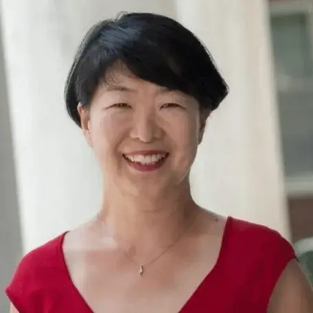 An image of Kunie Renaud smiling