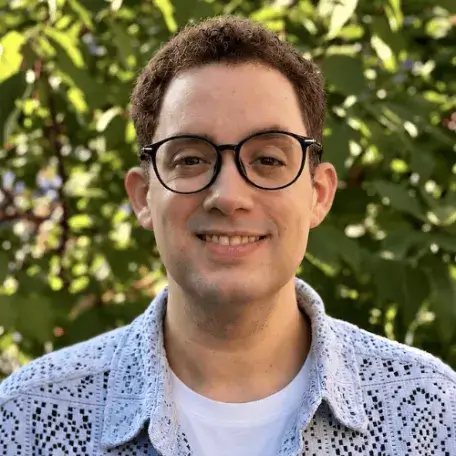 An image of Arby Ghemari smiling