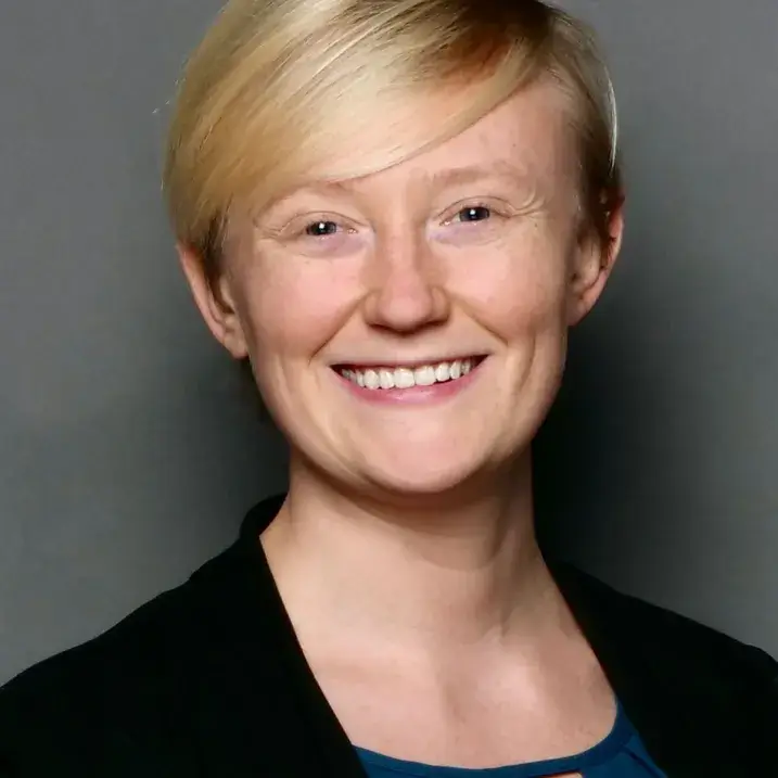 Lakelyn in a blue blouse and black blazer.