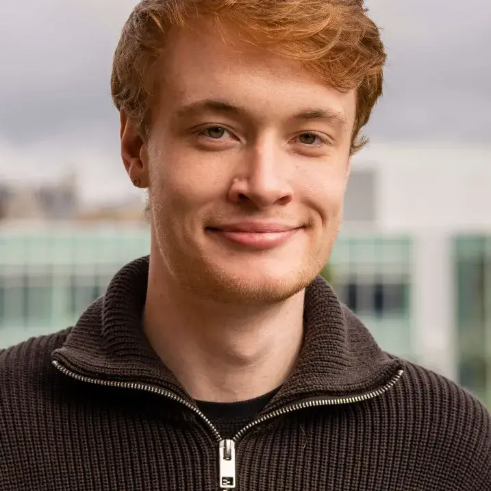 Photo of Sean outside of the Davis Center