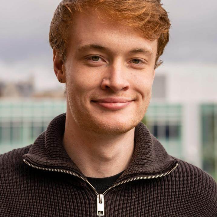 Photo of Sean outside of the Davis Center