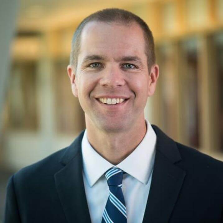 headshot of man smiling