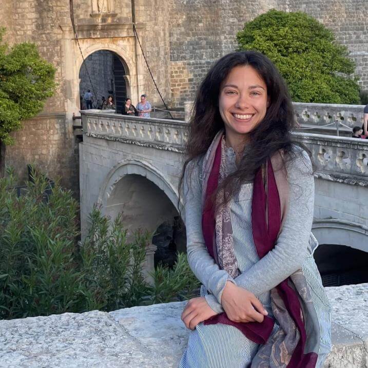 Sydney Baker in front of bridge
