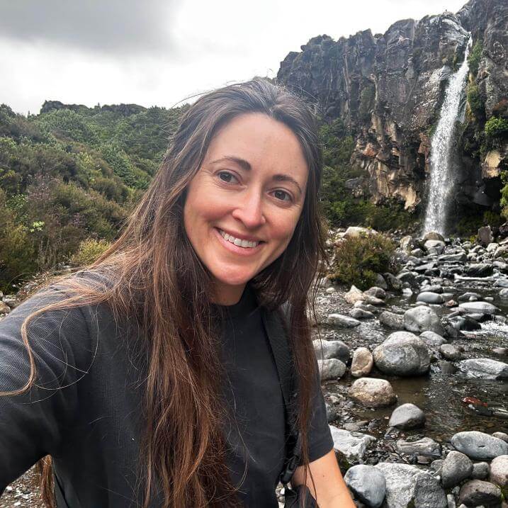 Lauren Hunt outdoors by a waterfall